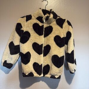 Size 130 (US Size 6-7 little girls) fleece heart jacket. Gently used/No Defects